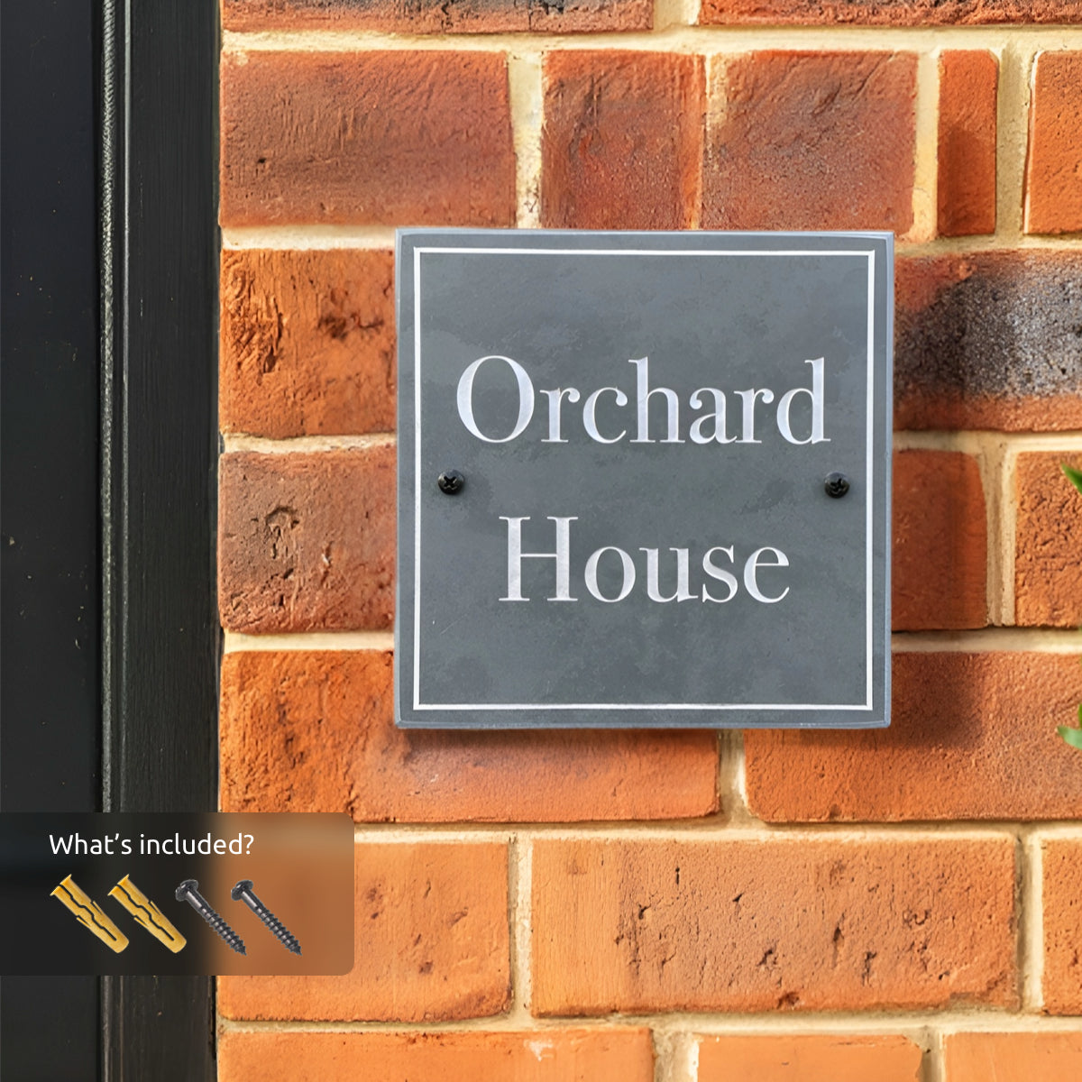 “Welsh slate house sign with ‘No. 8’ engraved in white, mounted on a red brick wall with natural sunlight casting shadows.”