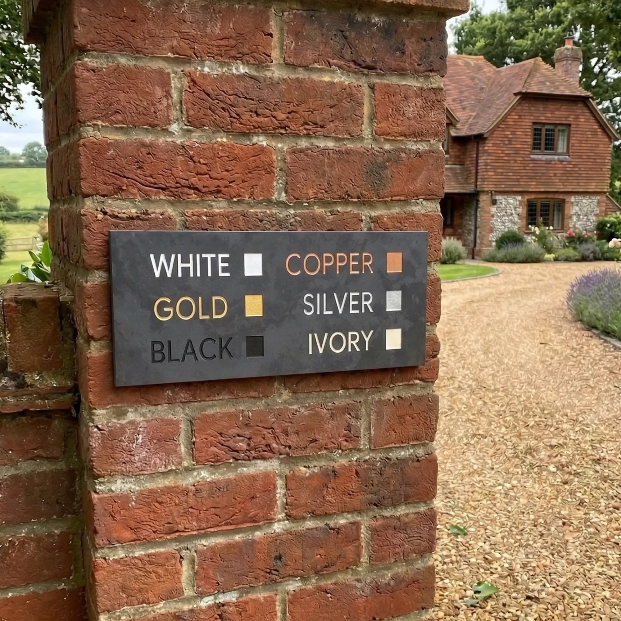 Engraving colour previews: black, white, gold, silver, copper examples on slate house signs
