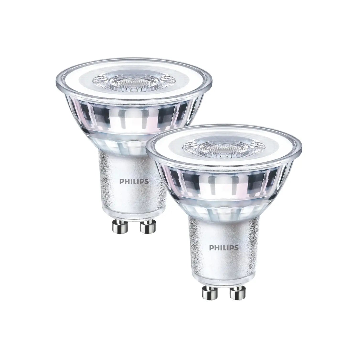 The image shows two Philips GU10 light bulbs with a clear, slightly reflective surface. These LED bulbs have a compact, spotlight-style design with a base featuring two small pins for easy installation. Their sleek and modern appearance suggests energy efficiency and bright, focused lighting.