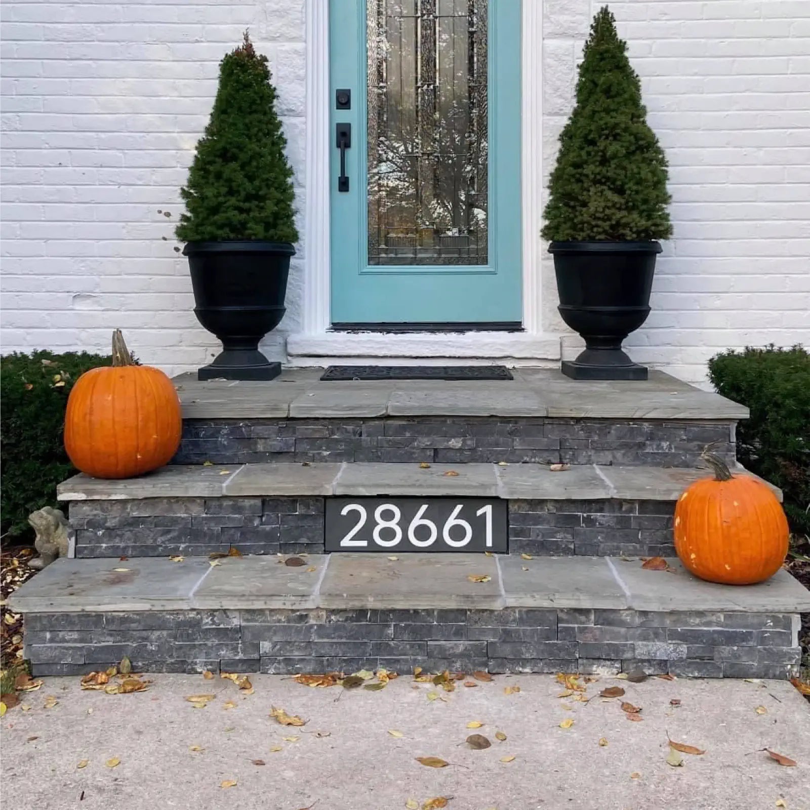 door entrance step sign with postcode number