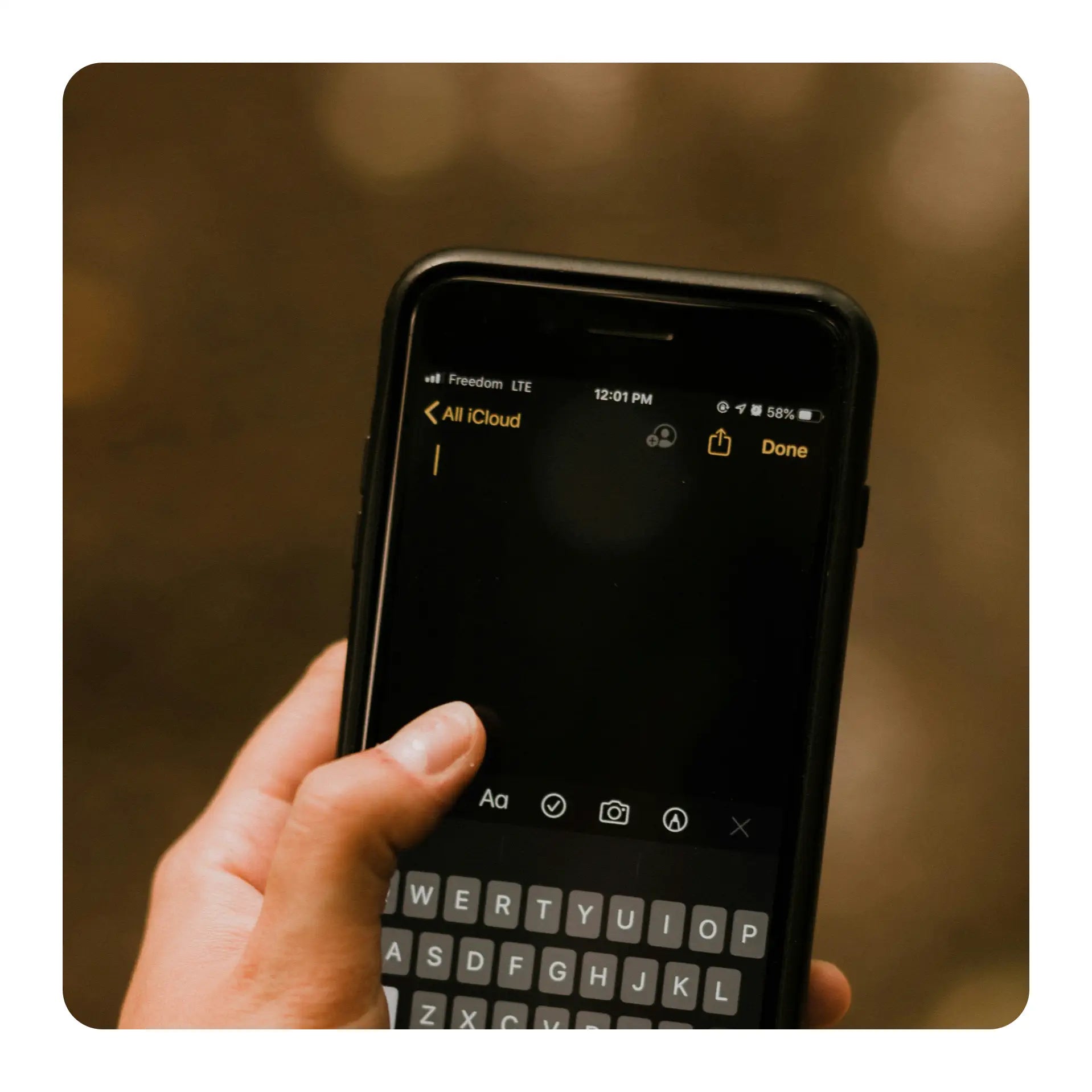 notes app open on womans phone outdoors