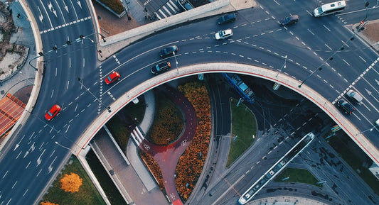 an aerial picture of a motorway bypassing a residential street