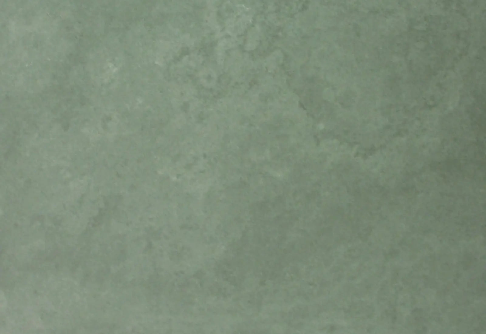 Close-up of a textured stone surface with a subtle pattern