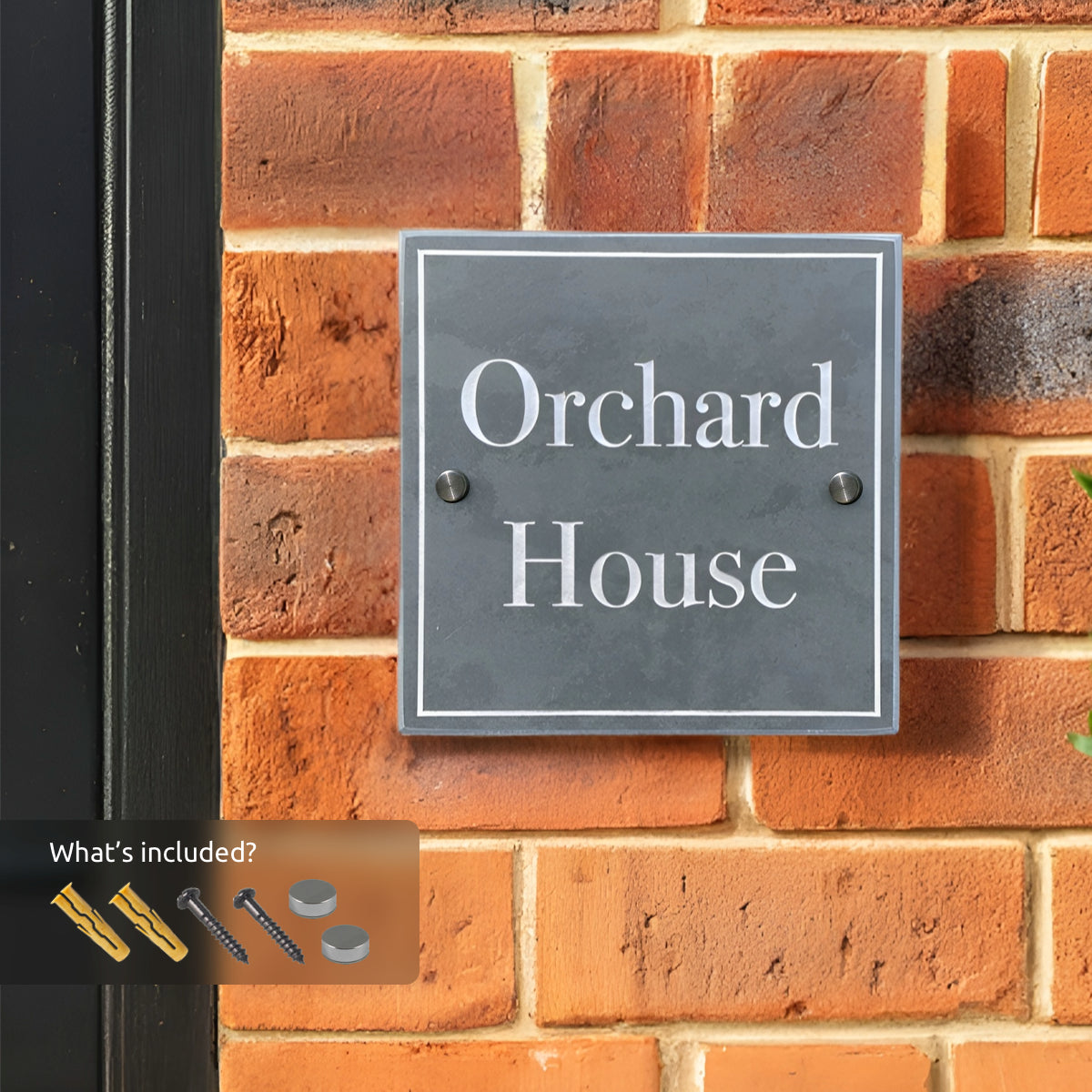 “Welsh slate house sign with ‘No. 8’ engraved in white, mounted on a red brick wall with two visible pre-drilled holes for mounting.”