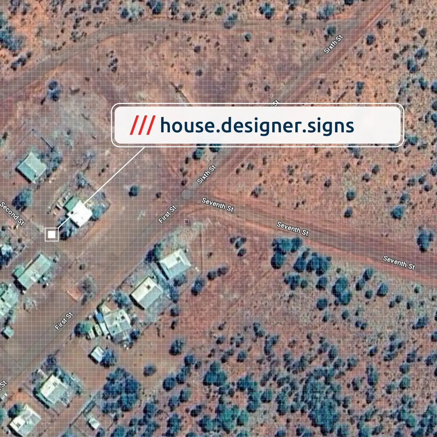 “Aerial map view showing a specific location marked with the what3words address ‘house.designer.signs’ highlighted on the map.”