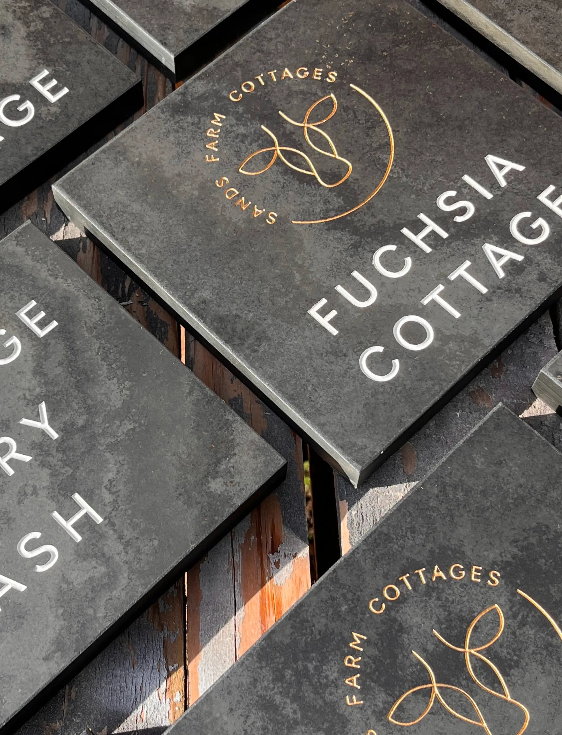 files/banner-2026-homepage-long-slate-house-sign-page.webp