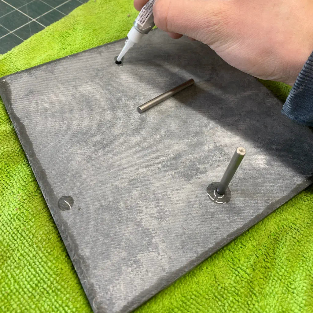 instructions on how to install hidden fixings in a slate house sign