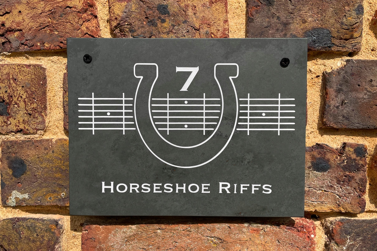 Bespoke horse shoe house sign