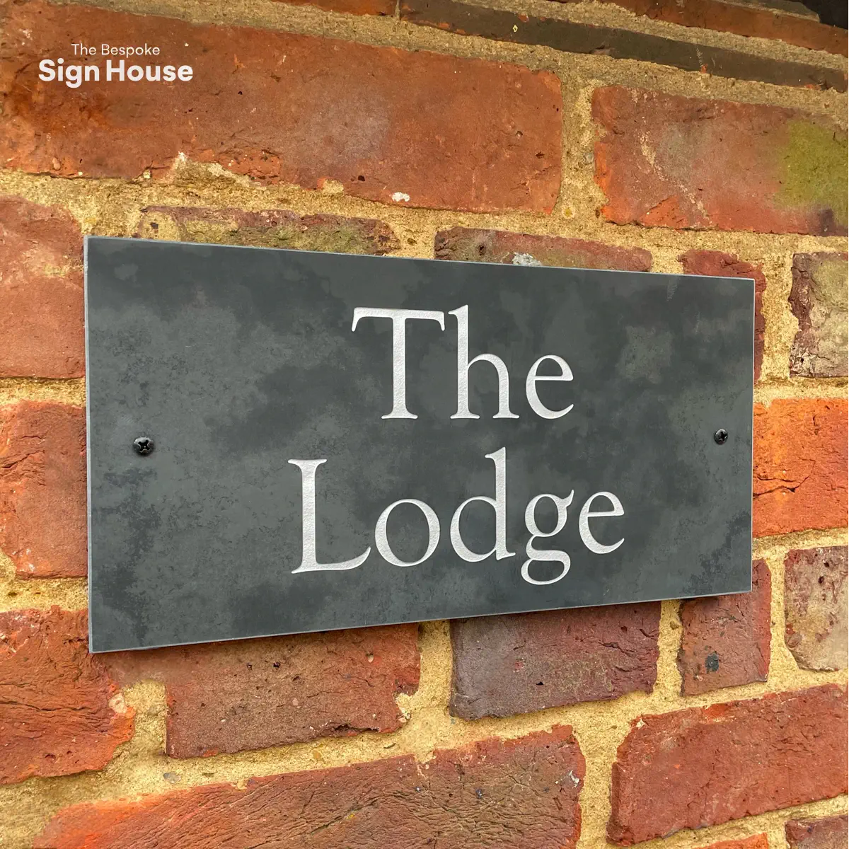 The Lodge slate sign