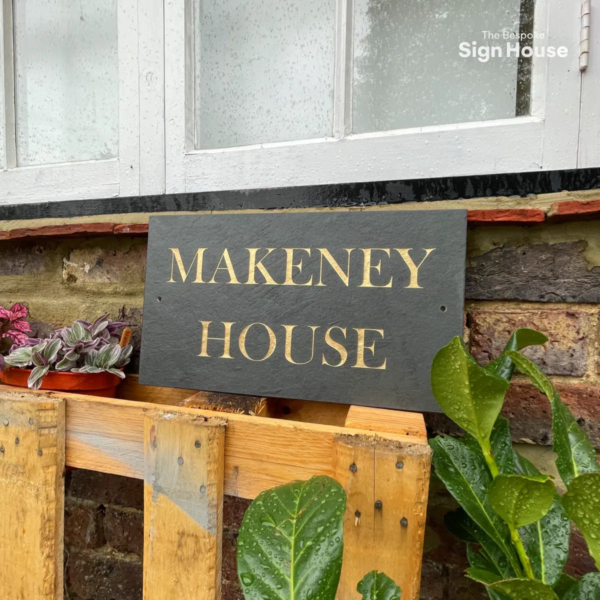 farmhouse slate name sign with gold lettering