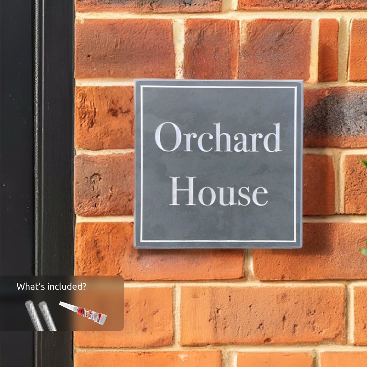 “Rectangular Welsh slate house sign displaying ‘No. 8’ in engraved white lettering, mounted on a red brick wall.”