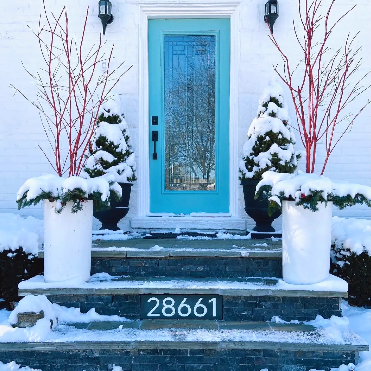 Slate number sign fixed in stone stairway