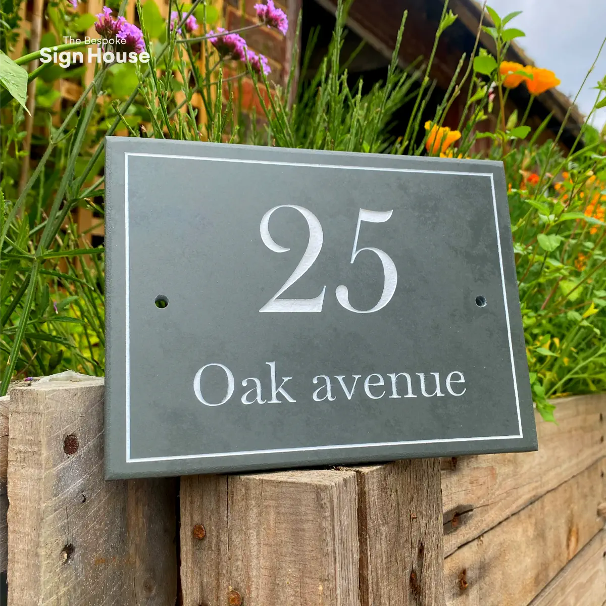 an elegant polished slate number and name plaque for homes and businesses