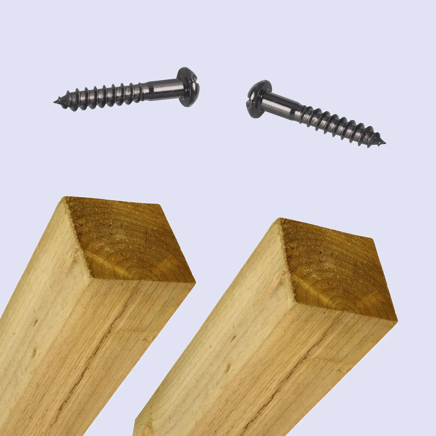 wooden posts and black screws in a grey background